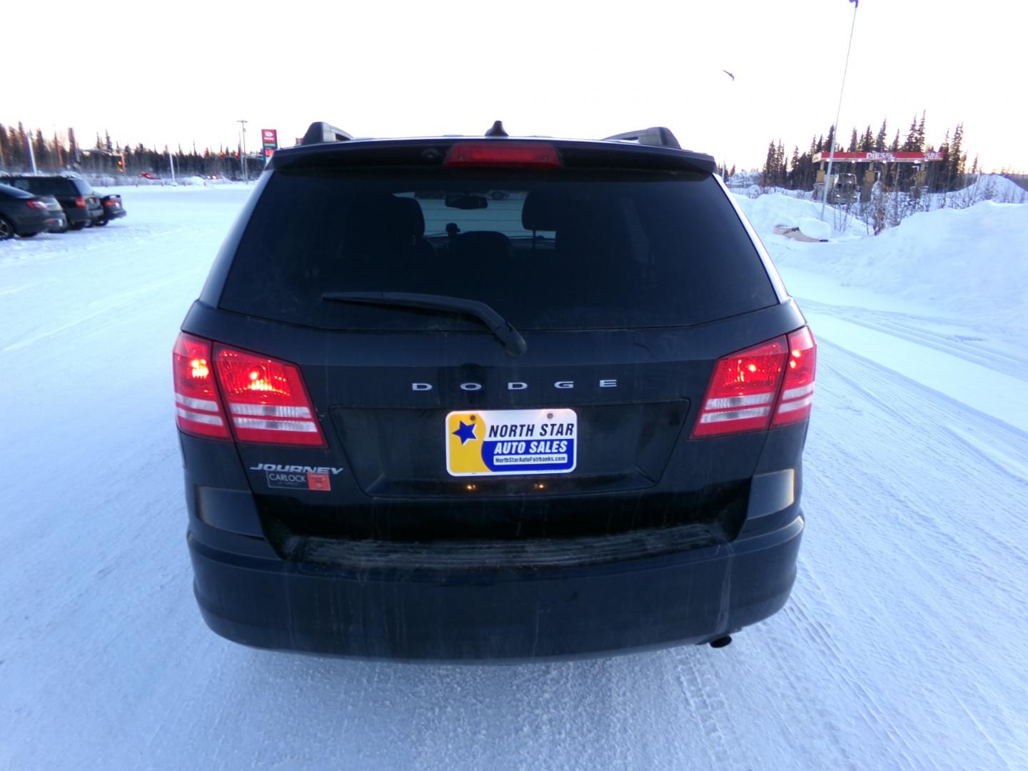 2017 Black Dodge Journey SE (3C4PDCAB0HT) with an 2.4L L4 DOHC 16V engine, 4A transmission, located at 2630 Philips Field Rd., Fairbanks, AK, 99709, (907) 458-0593, 64.848068, -147.780609 - Photo#3